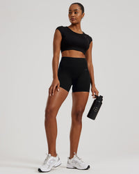 Motion Seamless Open Back Short Sleeve Crop Top | Black